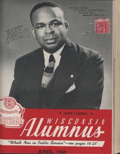 A headshot of G. James Flemming, wearing a suit and tie, pictured on the cover of the Wisconsin Alumnus Magazine, April 1949.